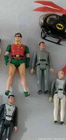 Group shot with Robin, three Star Trek figures, partial extra figure, Batman helicopter