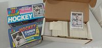 Both Bowman boxed sets, storage box with loose cards and sleeved card