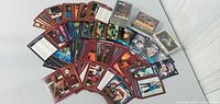 Spread of loose Star Trek TNG cards and sealed Space Caps packs