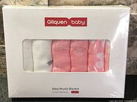 Front view of sealed retail box showing six folded blankets