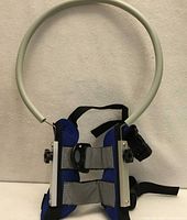 Front view of halo harness showing gray ring and blue harness body