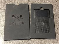 Front of Ekster sleeve and tracker card seated in inner tray