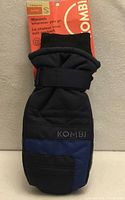 Front view of Kombi junior Snowblader mitt showing black body, blue accent, brand logo and retail tag