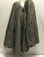 Three grey knit infinity scarves hanging together