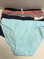 Stack showing five underwear in assorted colours