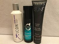 Front view of three hair care products showing labels