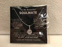 Front view of necklace on presentation card