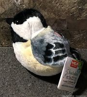 Front view of plush bird showing realistic coloration and overall shape