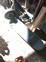 Skateboard deck showing wear