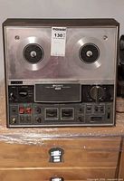 Front view showing full unit, reels area, control panel