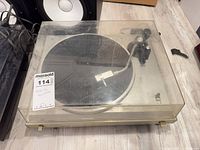 Top view of Toshiba SR-A102 turntable showing dust cover and overall wear
