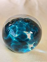 Front view showing blue cloud-like inclusions