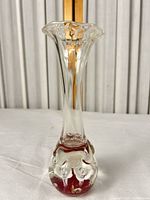 Full view of bud vase showing flared rim and colored base