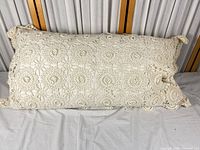 Full view of ivory hand-crocheted lace king pillow front