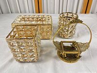 all four gold-tone crystal organizers grouped on table