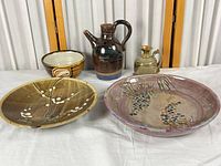 All five stoneware pieces arranged together