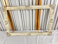Front view of ornate empty picture frame