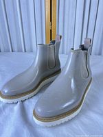 Pair of boots side by side showing uppers, color, and overall condition