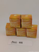 Front view of five sealed Ole Henriksen Banana Bright+ Eye Crème 3 mL boxes