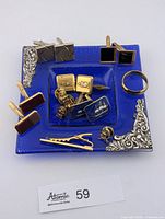 Overview of all accessories on blue glass dish