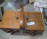 Closed wooden cantilever sewing box top view