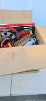 Boxed lot showing all items in cardboard box