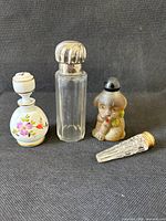 All four perfume bottles front view