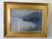 Frontal view of framed watercolor showing artwork, mat and gilt frame