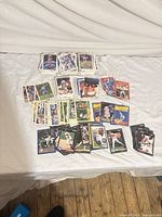 Spread of assorted baseball cards showing variety of brands and players
