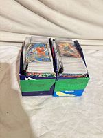 Two cardboard rows filled with Dragon Ball Super cards