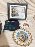Overview showing framed print, two plates and Adams sleeve
