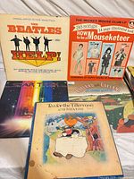 Front covers of all five LPs arranged together