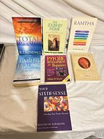 All seven paperback books displayed front covers