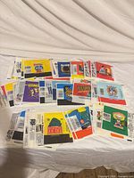 Grouped view of entire lot of wrappers spread on surface