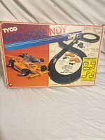 Box lid showing Tyco Molson Indy branding
