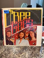 Front cover of Bee Gees Love Collection LP showing title and band photo