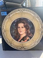 Front cover of Bonnie Raitt Streetlights LP showing portrait artwork and age wear