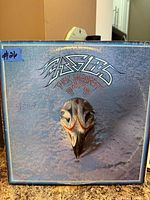 Front of Eagles “Their Greatest Hits 1971-1975” LP jacket showing artwork and wear