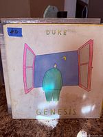 Front cover of Genesis Duke LP showing artwork and wear