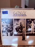 Front cover showing album art and band name