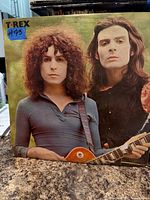 Front cover of T. Rex self-titled vinyl LP showing band members and condition