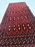 Full view of Turkman rug showing overall design and condition