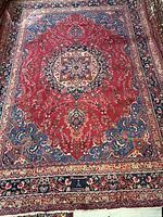 Full view of Mashad rug showing field, borders and overall pattern