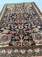 Full rug showing Tree of Life design and borders