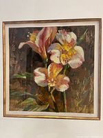 Front view of framed painting showing floral artwork, mat, and frame