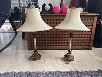 Both table lamps with shades shown standing on floor