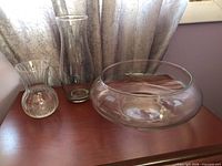 All three clear glass vases displayed together