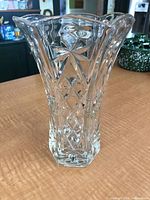 Full view of clear pressed glass Anchor Hocking Star of David vase standing upright