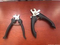 Both nail clippers side by side closed