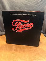 Front cover of Fame original soundtrack vinyl LP showing title and label
